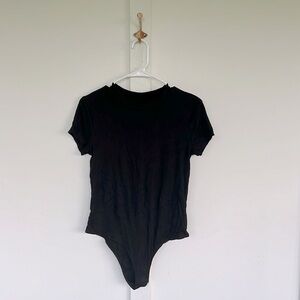 A New Day black bodysuit